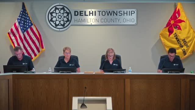 Delhi Township honors police officers Chetwood and Jasper at Christmas parade ceremony