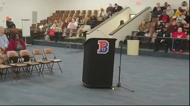 Wendy Smith highlights perfect attendance and school history at board meeting