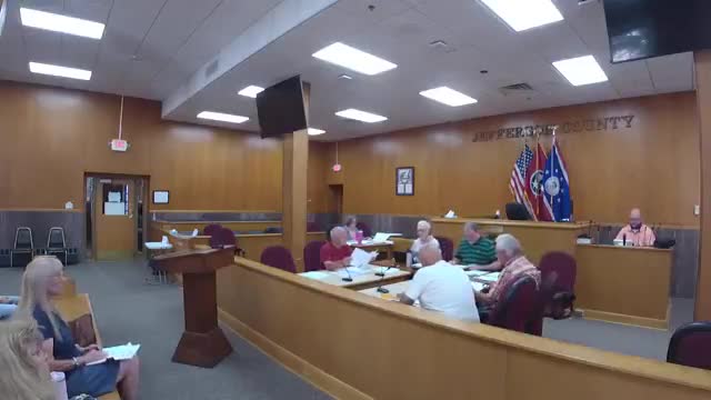 Commission grants two front‑setback variances for garage and new house sites