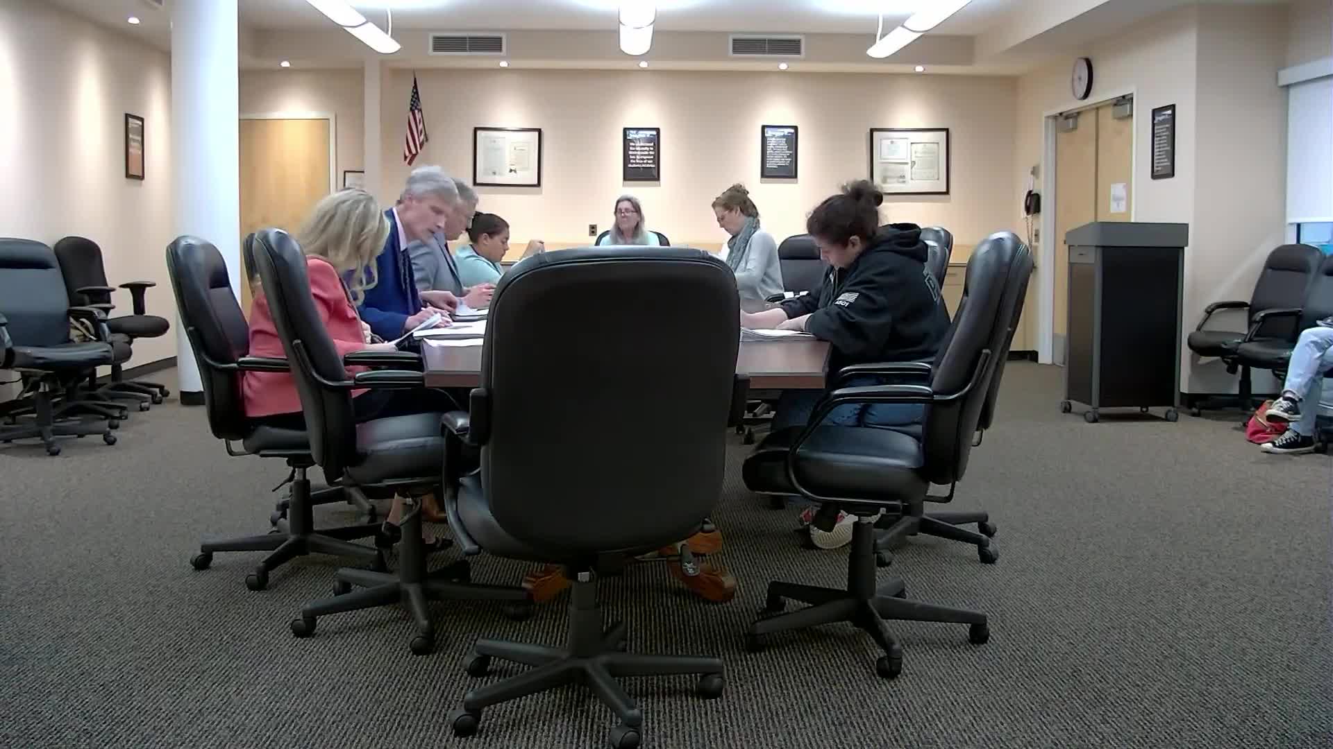 Port Washington committee debates dress code, discrimination definitions while updating district code of conduct