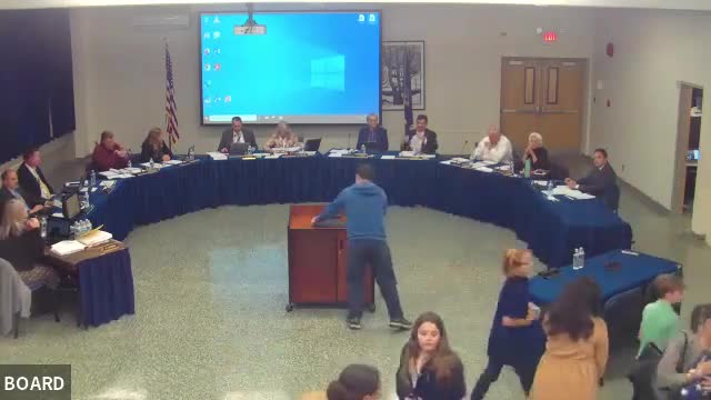 Robin Rand honors Evan Liu as Mathematics Student of the Year