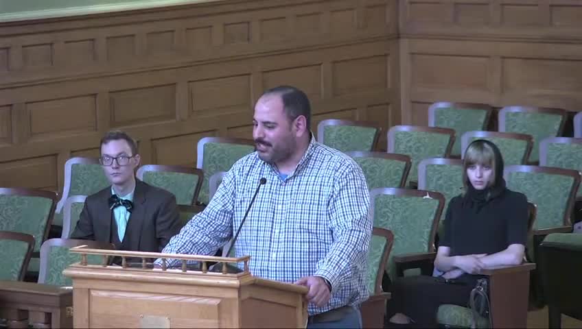 Bay City residents protest government policies and demand action against ICE and genocide