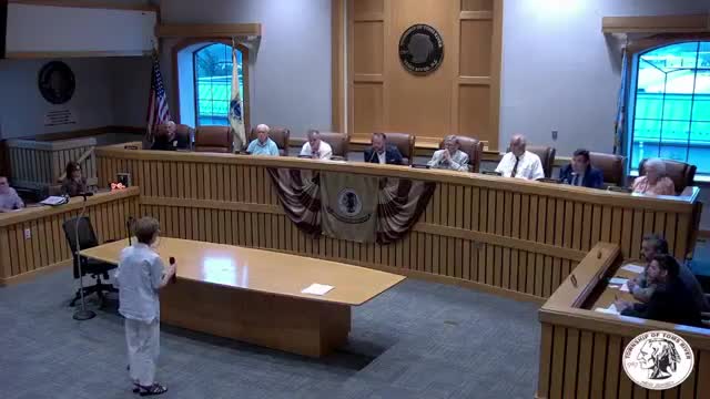 Michael Rizzuto advocates for affordable housing solutions at community meeting