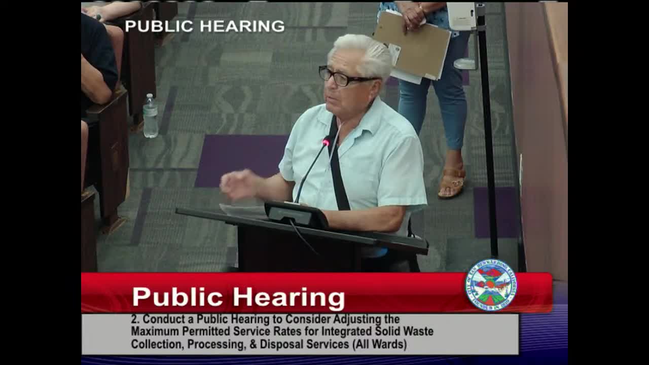 Clementina Pina challenges outdated financial discrepancies at community meeting