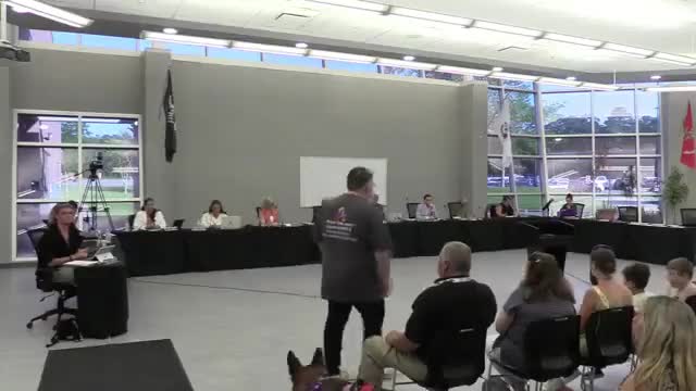 Board honors student 'Upstanders' and therapy-dog volunteers; student rep outlines initiatives