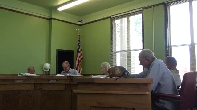 Commissioners debate travel reimbursement and training repayment rules; staff to refine policy