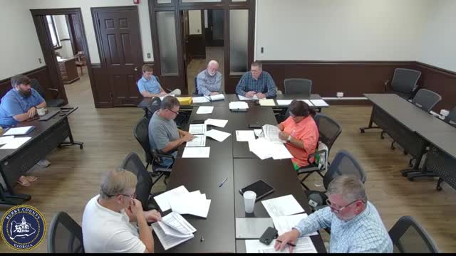 Commissioners press for contractor insurance proof after repeated off-contract work and billing concerns