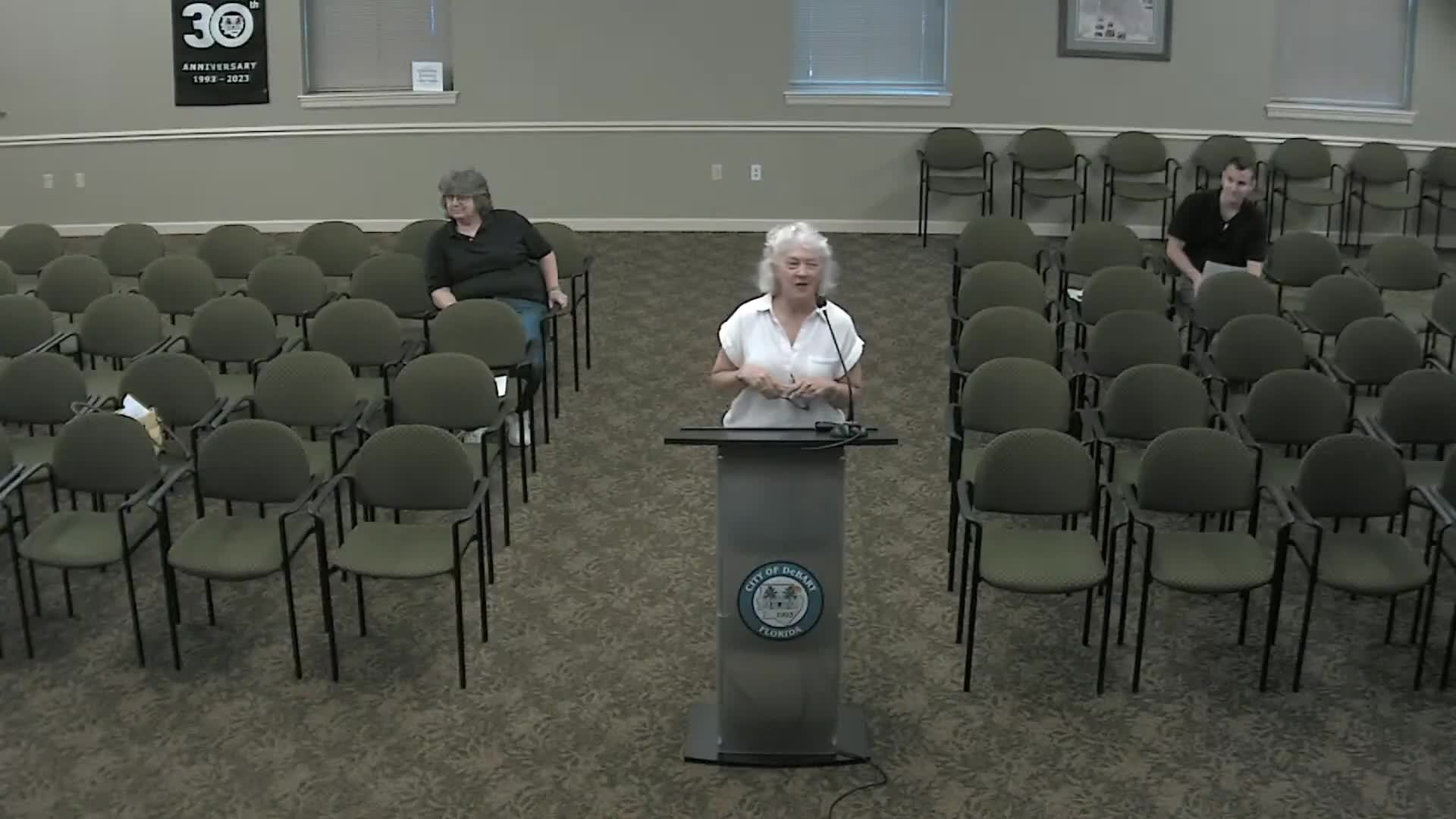 Resident asks whether city can stop Aldi conversion of Winn‑Dixie; staff says private sale not subject to city approval