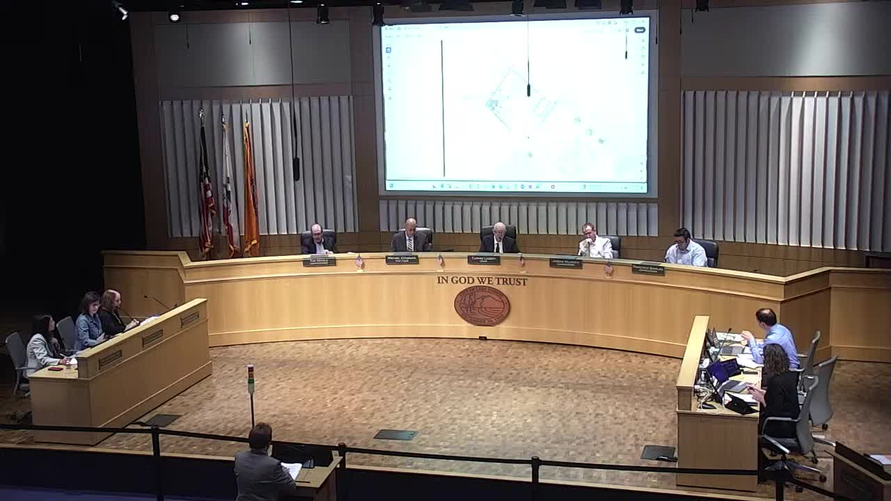 Chair Ludden invites speakers to share insights at public forum