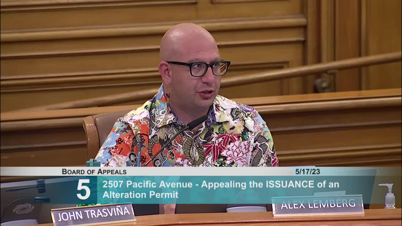 Neighbors dispute access rights to shared fire escape during permit hearing