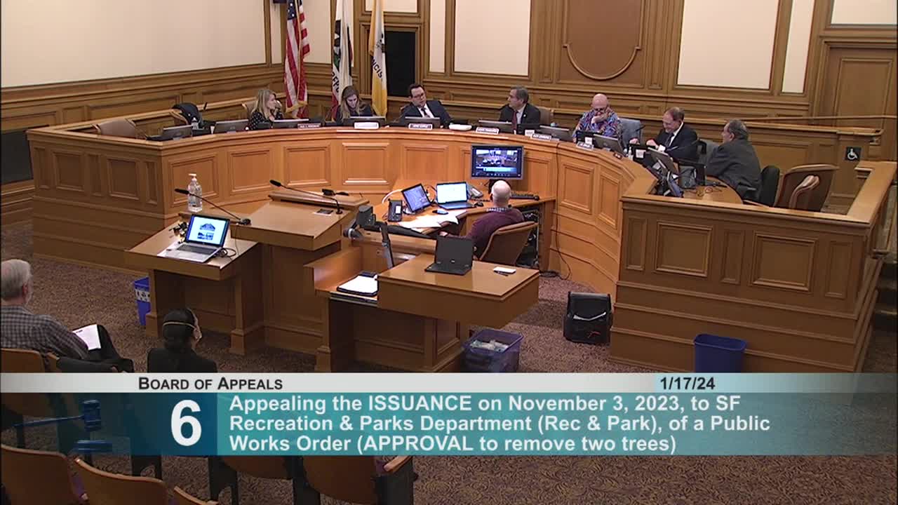 Commissioner Trezvina advocates for preserving two healthy trees during canopy discussion