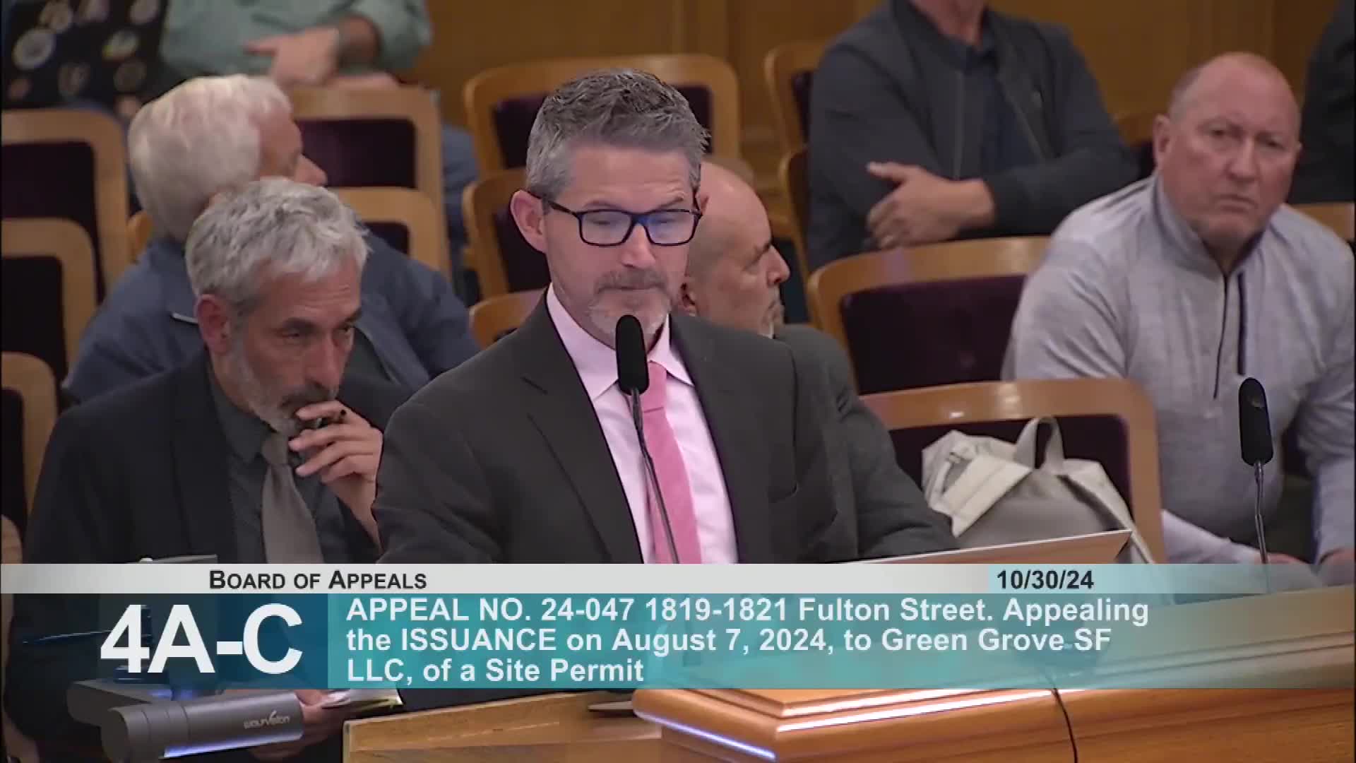 Commissioner Swiggs questions DBI representatives on building code compliance