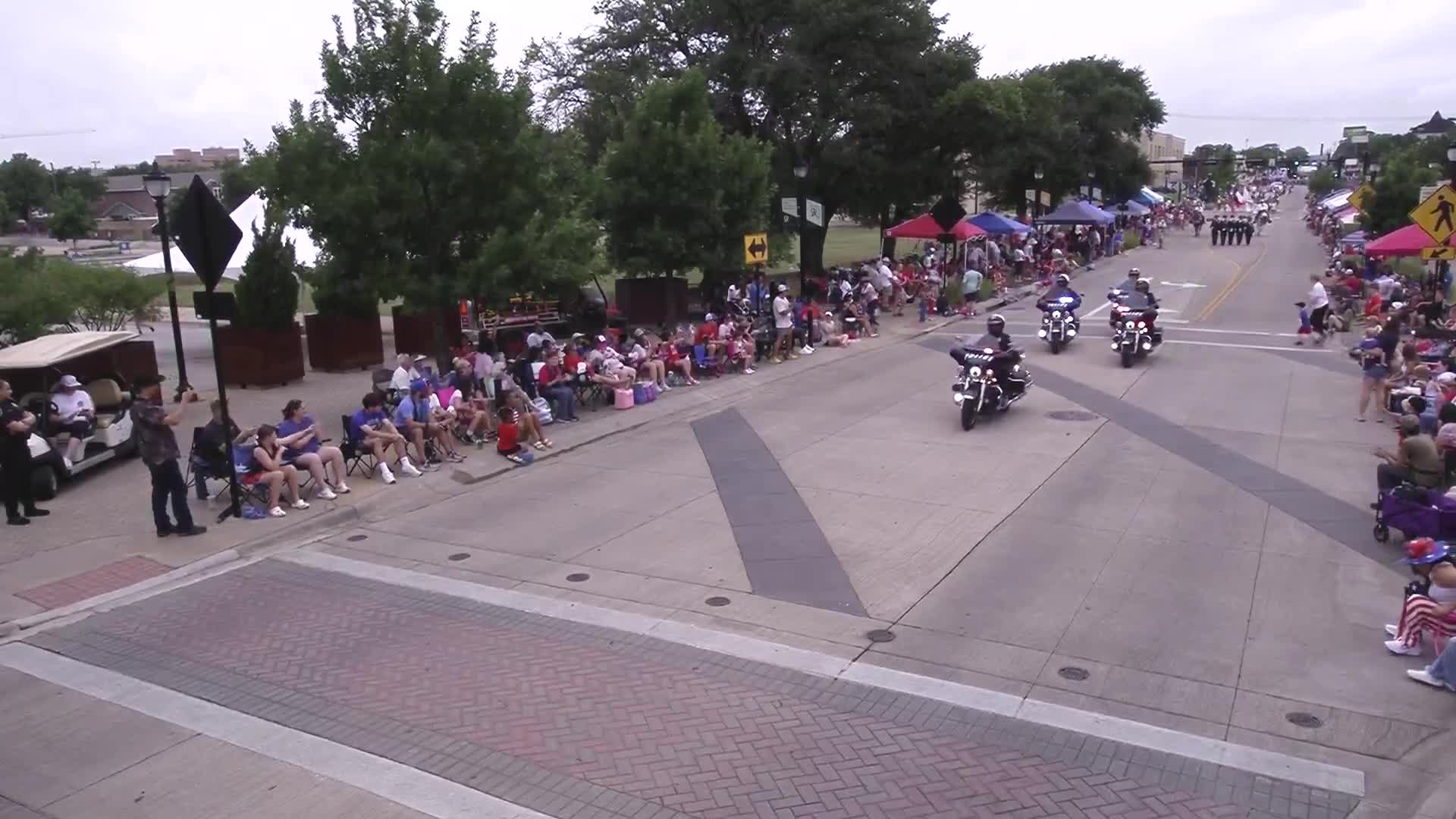Arlington celebrates community with parade featuring police, GM team, and Medal of Honor CEO