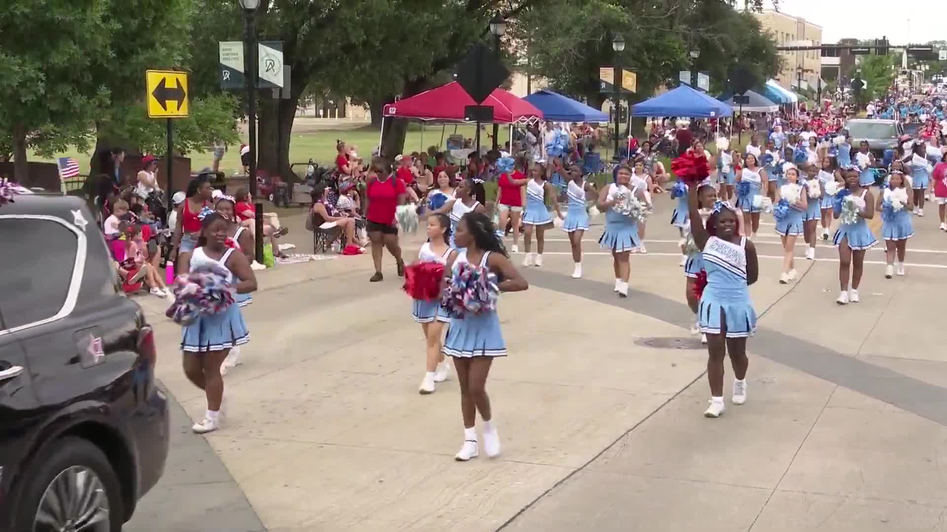 Seguin High School cheerleaders and band showcase spirit at Independence Day celebration