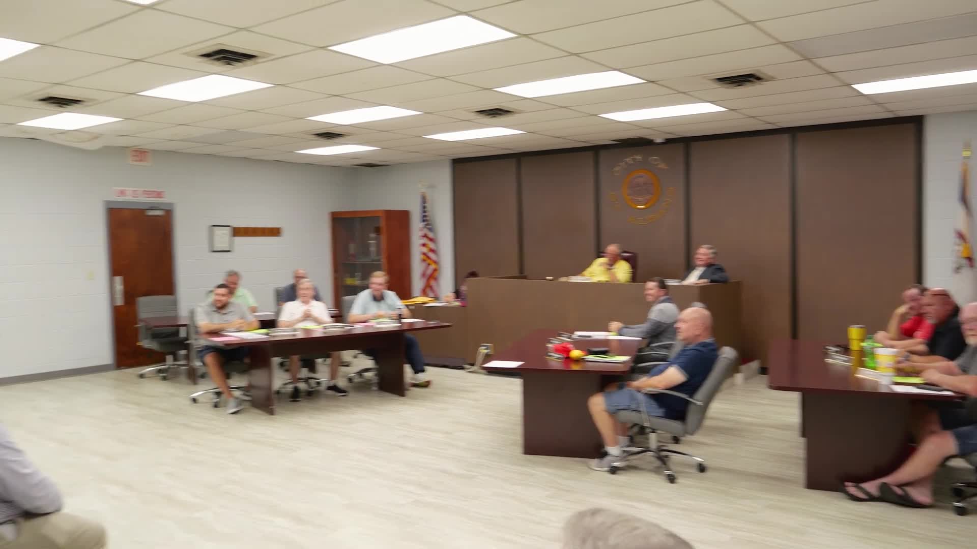 Resident raises safety concerns at South Washington and Bear; council discusses speed signs and mobile speed humps