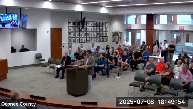 Oconee developers propose synthetic wood fence and evergreen buffer for property project