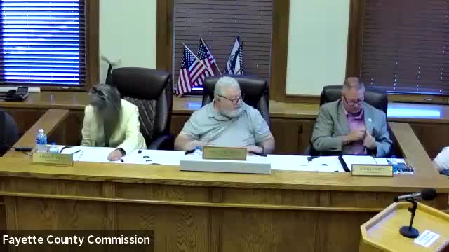 Amy leads Pledge of Allegiance at community meeting