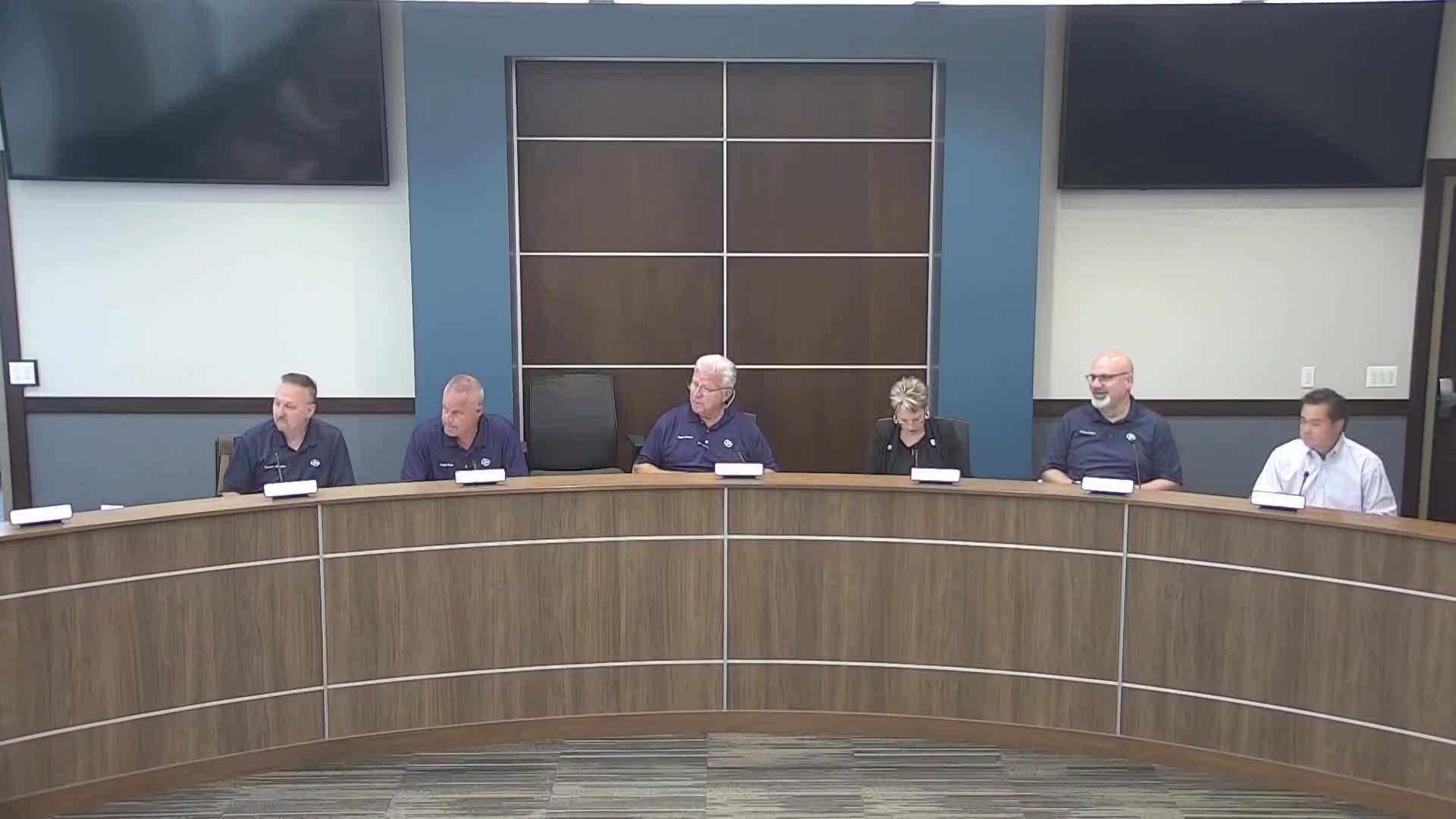 Residents submit emailed objections to proposed 20‑unit apartment project; odor complaint about water reclamation center also filed