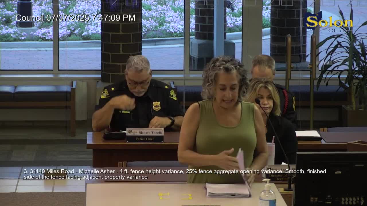 Homeowner protests new construction over high windows invading privacy