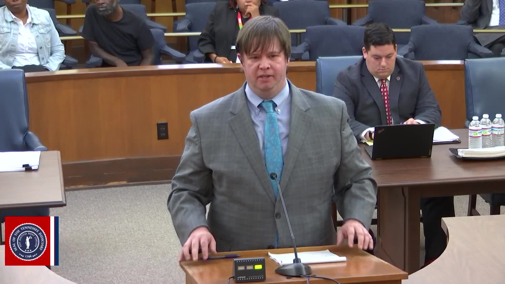 Defense urges reversal after prosecutor called defendant a 'thug' and told jury to 'do your duty'; state says curative instruction cured error