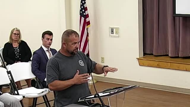 Construction error caused sewage intrusion at city building; remediation underway and Civic Center patio work paused pending ADA ramp work