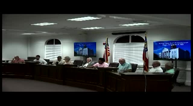 After executive session, commissioners approve a hire and authorize legal steps on multiple matters