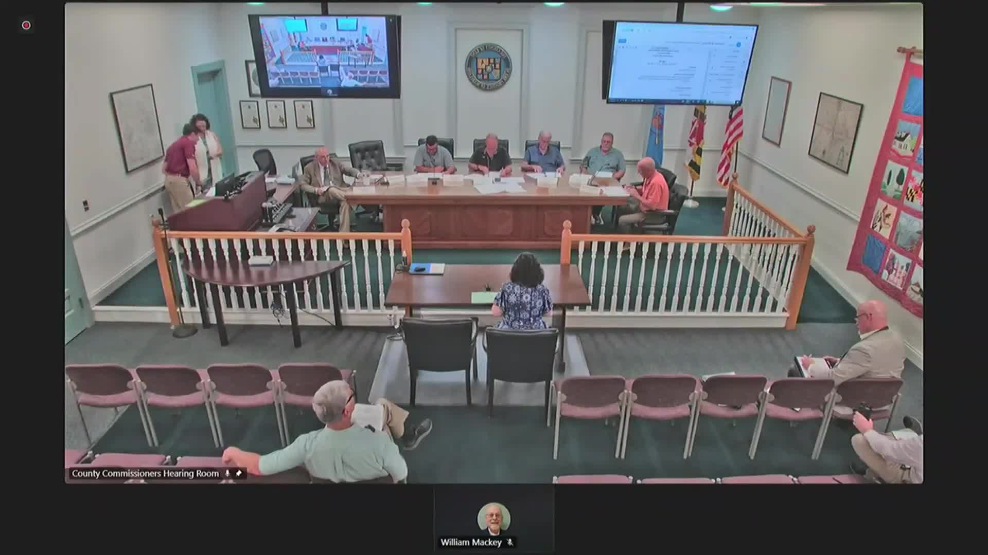 Planning commission grants preliminary approval for 60x100 Massey Aero hangar after debate over expedited final review