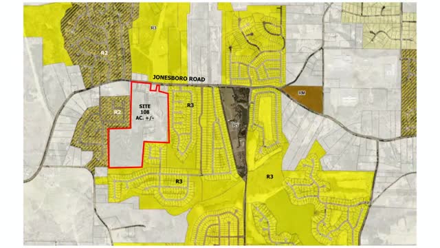 Development plan aims to preserve wooded buffers on last unzoned site