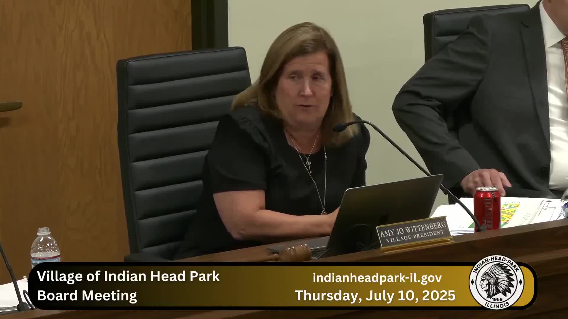 Resident questions memorial bench on village berm; board to discuss memorial policy at Committee of the Whole