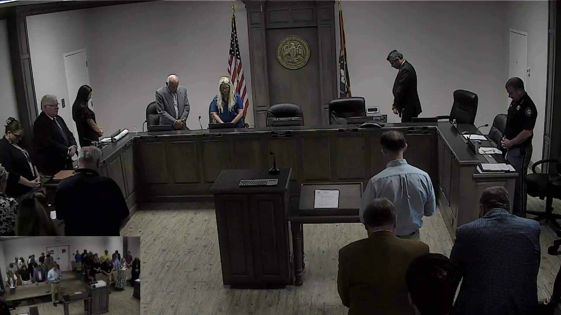 Local leaders gather for community prayer and meeting proceedings