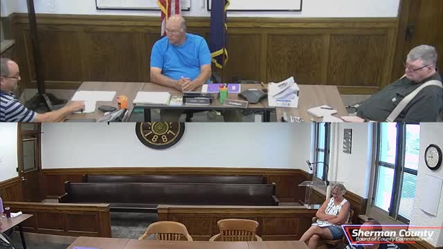 Local farmers discuss wheat harvest challenges and flood risks in community meeting