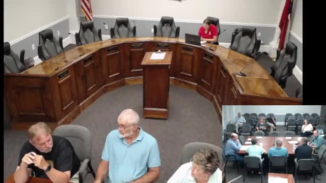 Local Council Discusses Development Challenges and Water Access on Highway 57