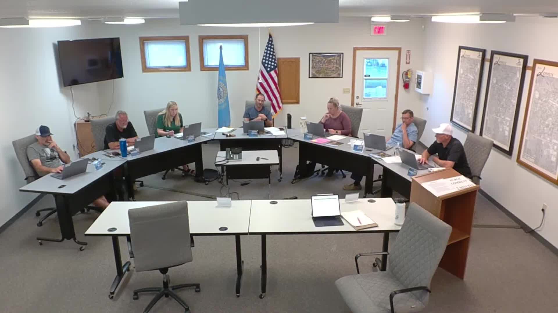 Council approves wage increase for Dusty Lau retroactive to licensure date