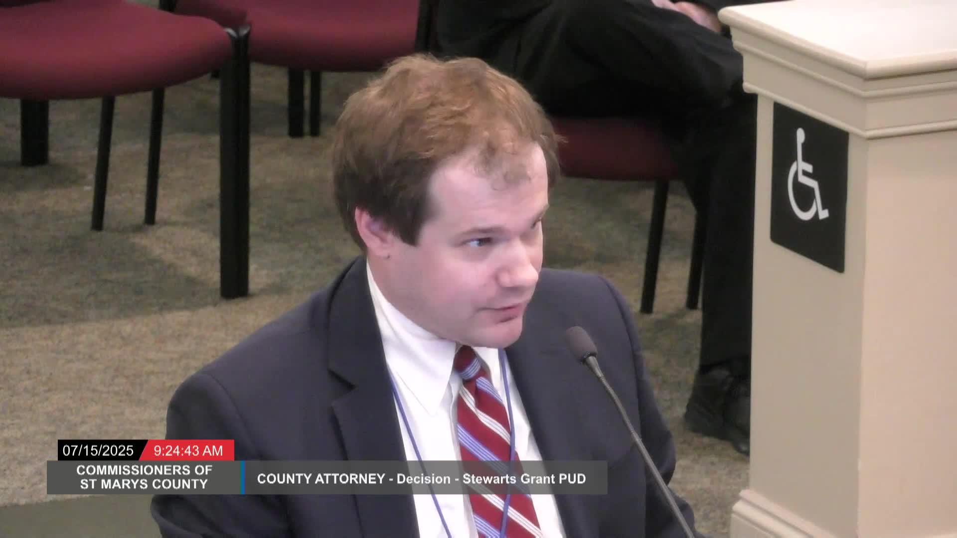 Commissioner Wairo addresses school seat capacity concerns in meeting