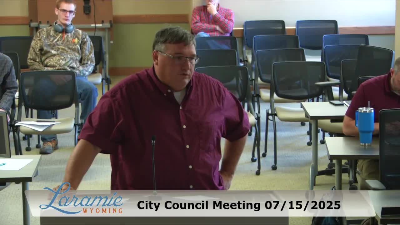 Council debates low bid from American Road for chip seal project