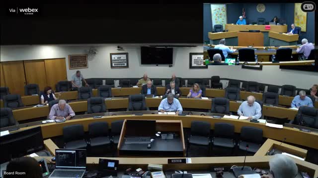 Finance report: month‑to‑month variance and bond filing fees noted