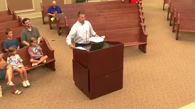 Planning commission backs conditional-use permit for used-car lot with parking, landscaping limits