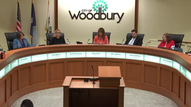 Council reviews concept plan for nine‑lot PUD at 4255 Wood Lane Drive; no vote taken