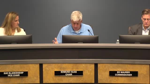 Commission approves rezoning at 804 Bullock Drive to allow new house; owner must remove paved parking and install fence