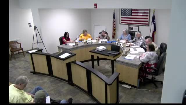 Commissioners approve lease-purchase for eight new dump trucks and authorize financing resolution