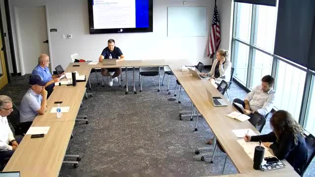 Committee supports using surplus bond proceeds to buy land near event center; parking revenue and graduation fees discussed