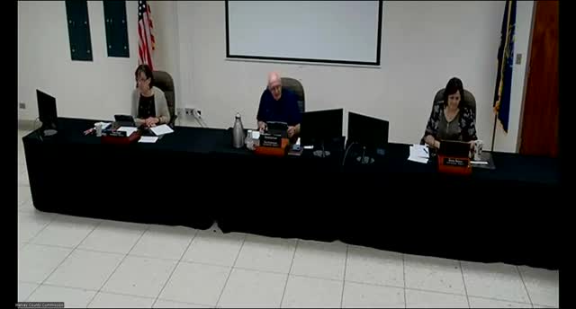 Commissioners adopt resolution 2025‑19 to formalize stop signs at SE 40th and South Webb Road