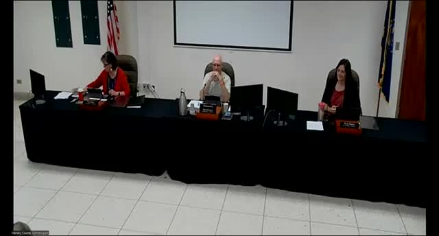 Resident tells Harvey County commissioners floodplain maps and battery storage worry farmers and neighbors