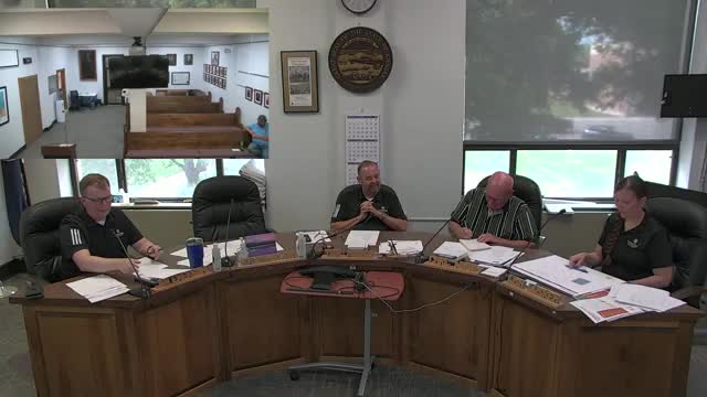 County reviews three bids for Judicial Center alarm monitoring; decision deferred