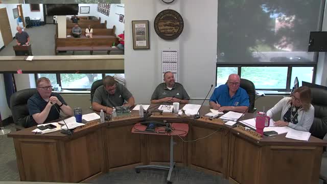 Resident urges commissioners to set deadline for comprehensive‑plan survey; wind and zoning questions raised