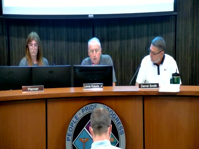Commission Approves Revised Designs for North Side Building Facade