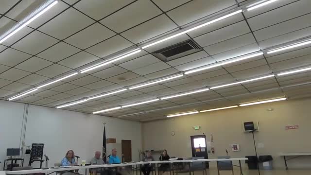 Drainage board debates 75‑foot solar setback from ditches and who must enforce it