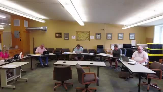 Board accepts sheriff's dispatcher resignation, approves sick‑time donation and appoints civil service commissioner