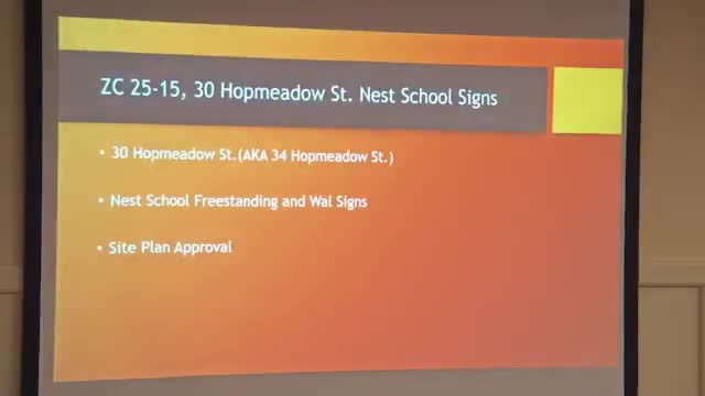 Commission tables Nest School sign application after design‑review color change