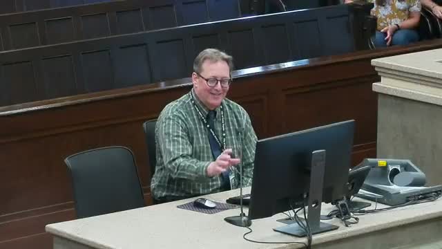 Panel approves setback and parking-setback reductions for 48,400 sq ft industrial building at 1040 First Avenue Drive SW